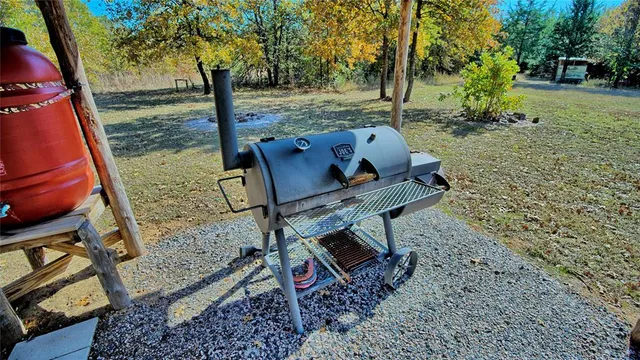 a backyard of a house with outdoor seating
