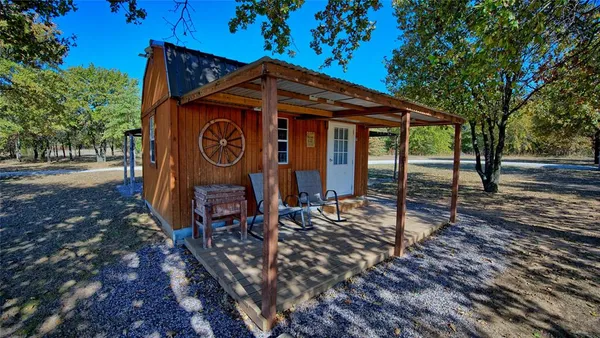 a view of a living room and dining room