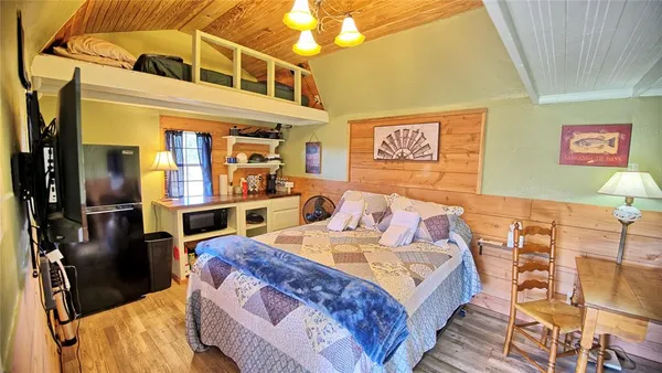 a view of backyard with large trees