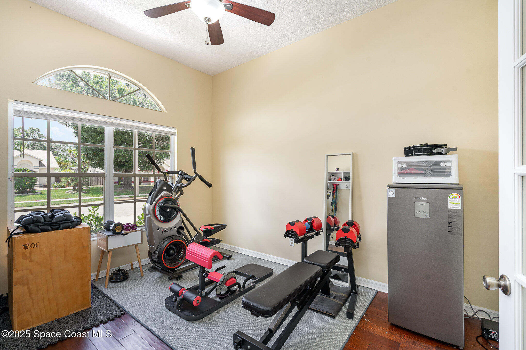 3623 Egret Drive Melbourne, FL 32901 - Photo 19 of 25 a view of a livingroom with furniture hardwood floor and workspace