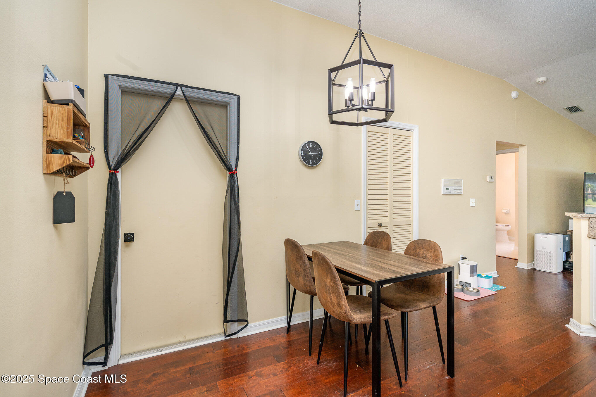 3623 Egret Drive Melbourne, FL 32901 - Photo 8 of 25 a view of a livingroom with furniture and wooden floor