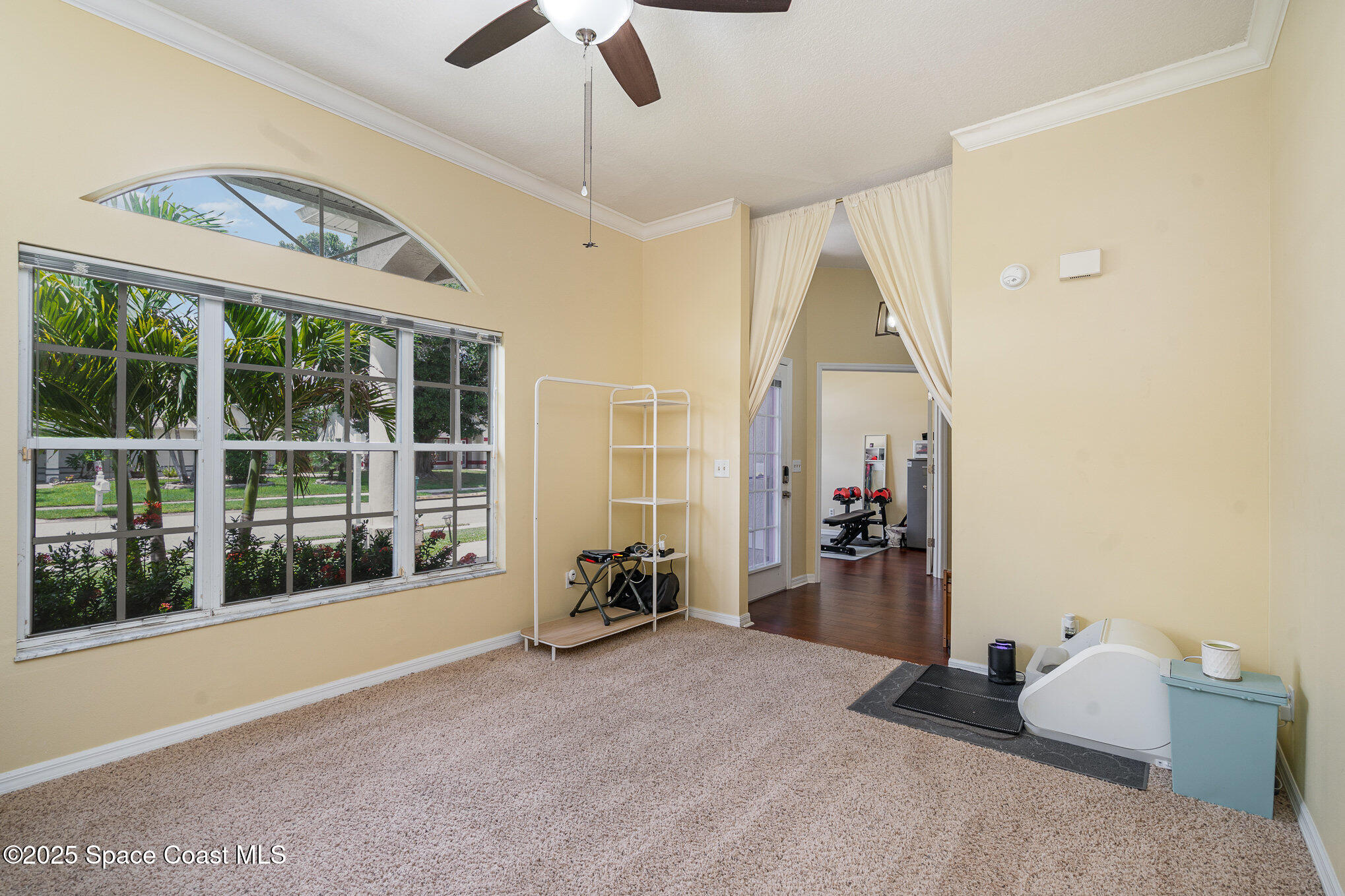 3623 Egret Drive Melbourne, FL 32901 - Photo 9 of 25 a view of livingroom with furniture and windows