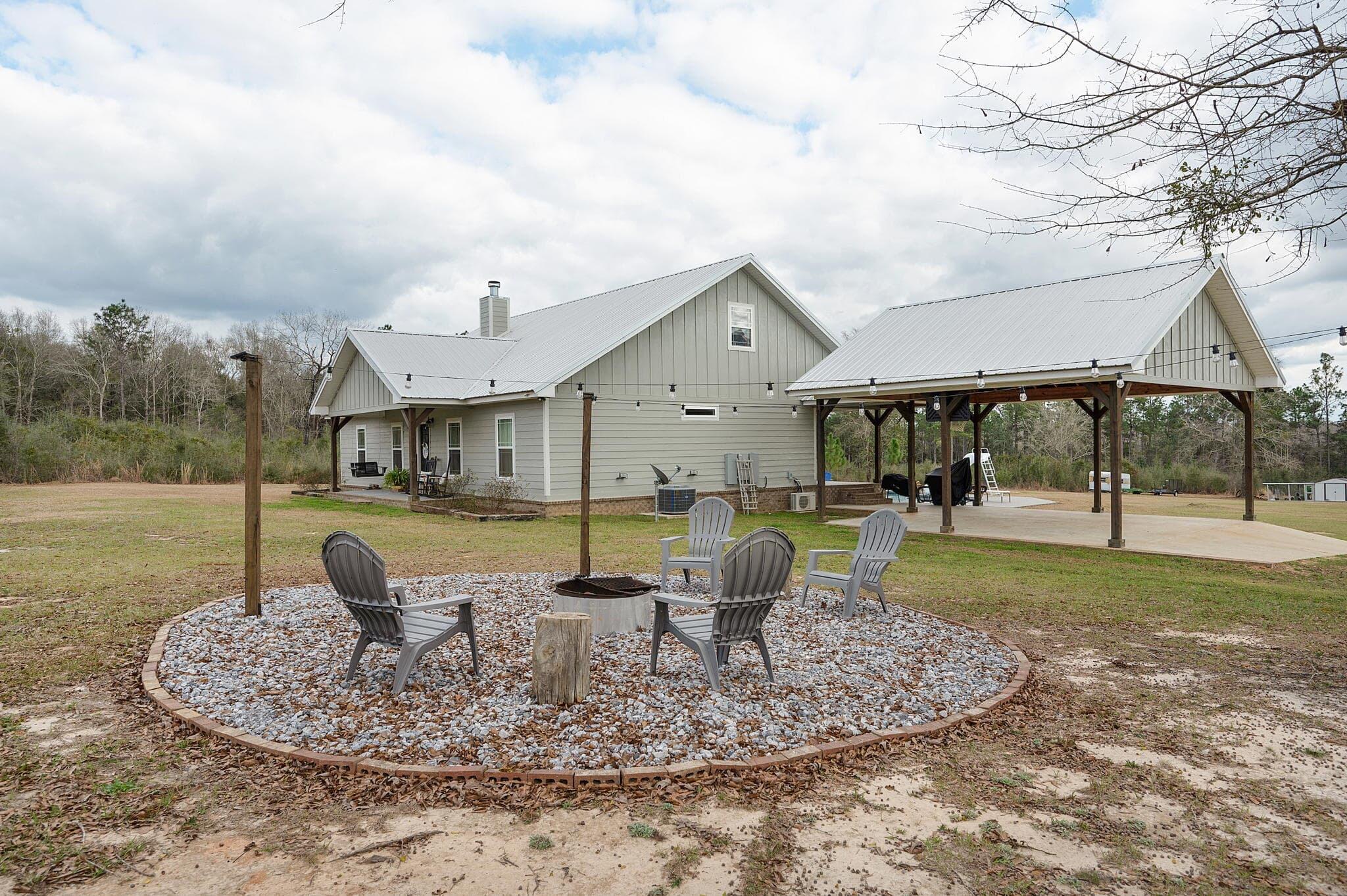 30116 Edwards Road Florala, AL 36442 - Photo 54 of 54 a swimming pool with lots of tress in the background
