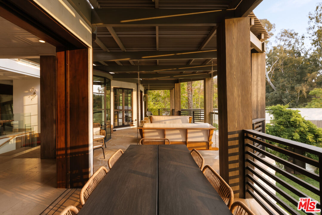 1105 Rivas Canyon Road Pacific Palisades, CA 90272 - Photo 20 of 49 a view of balcony with chairs