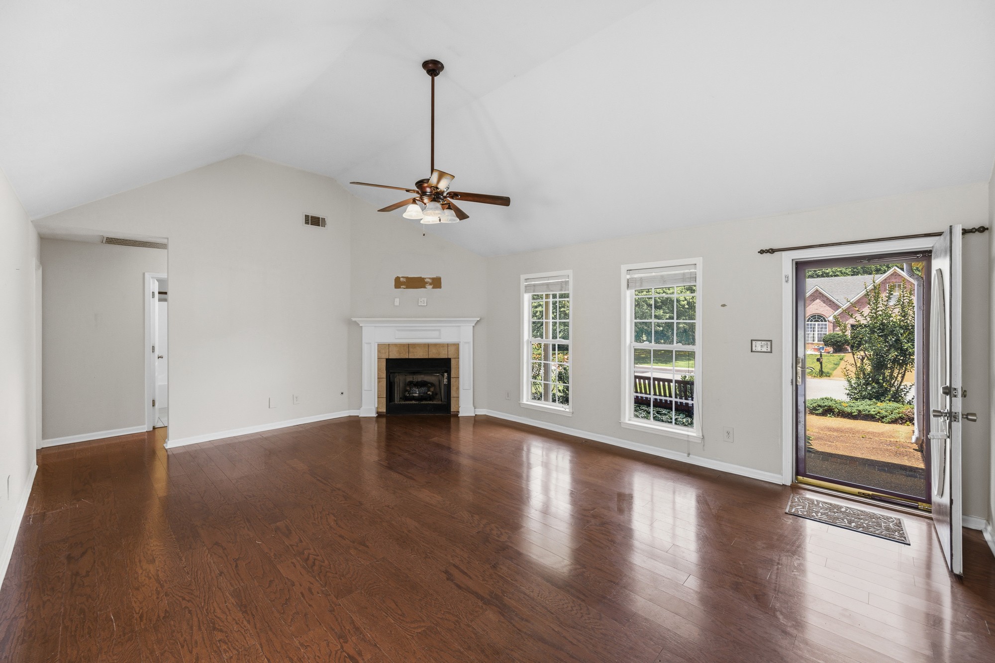 270 Reed Circle Medina, TN 38355 - Photo 13 of 30 a view of an empty room with wooden floor and a window