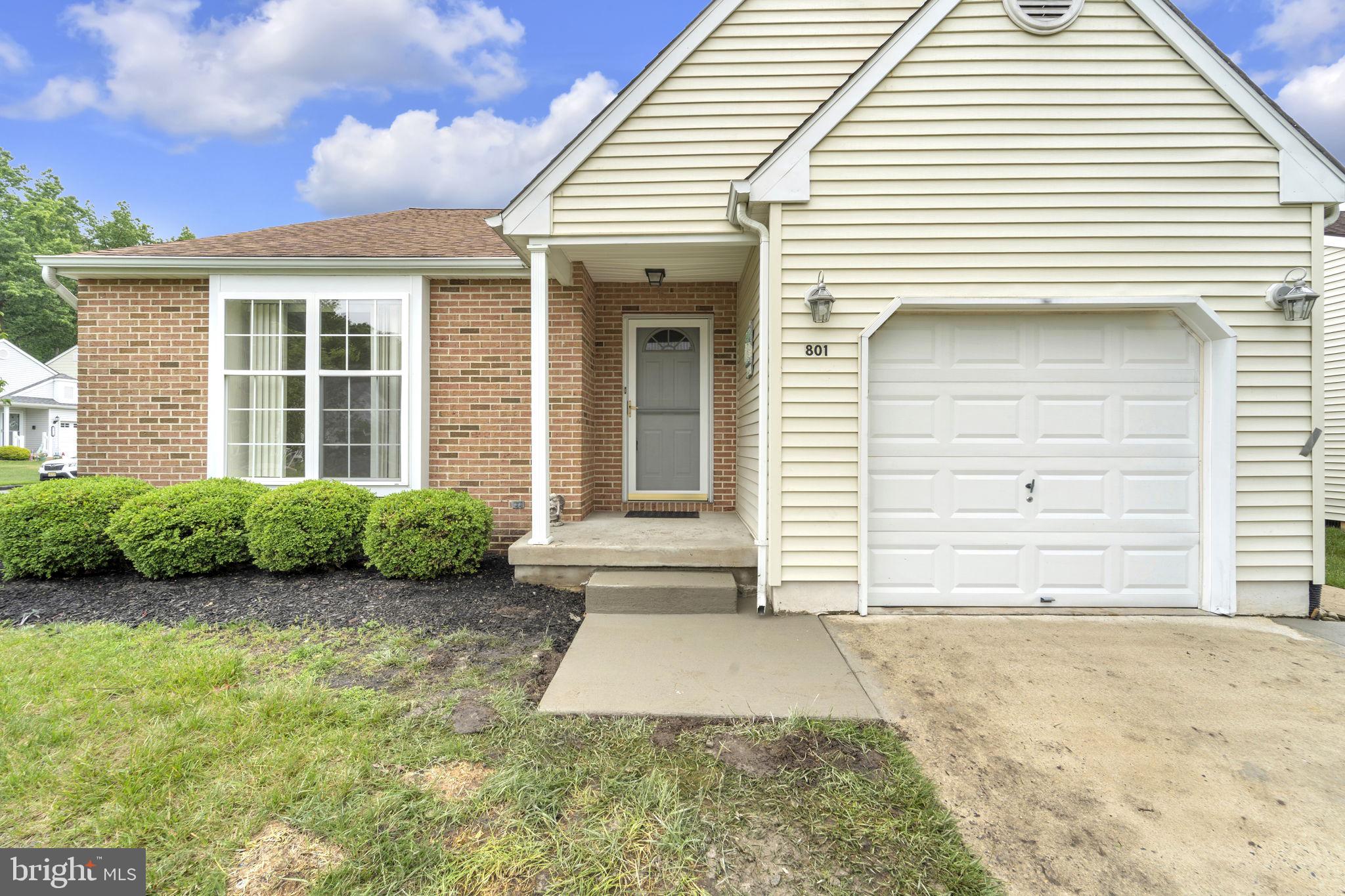 801 Freeport Way Williamstown, NJ 08094 - Photo 1 of 29 a front view of a house with a yard