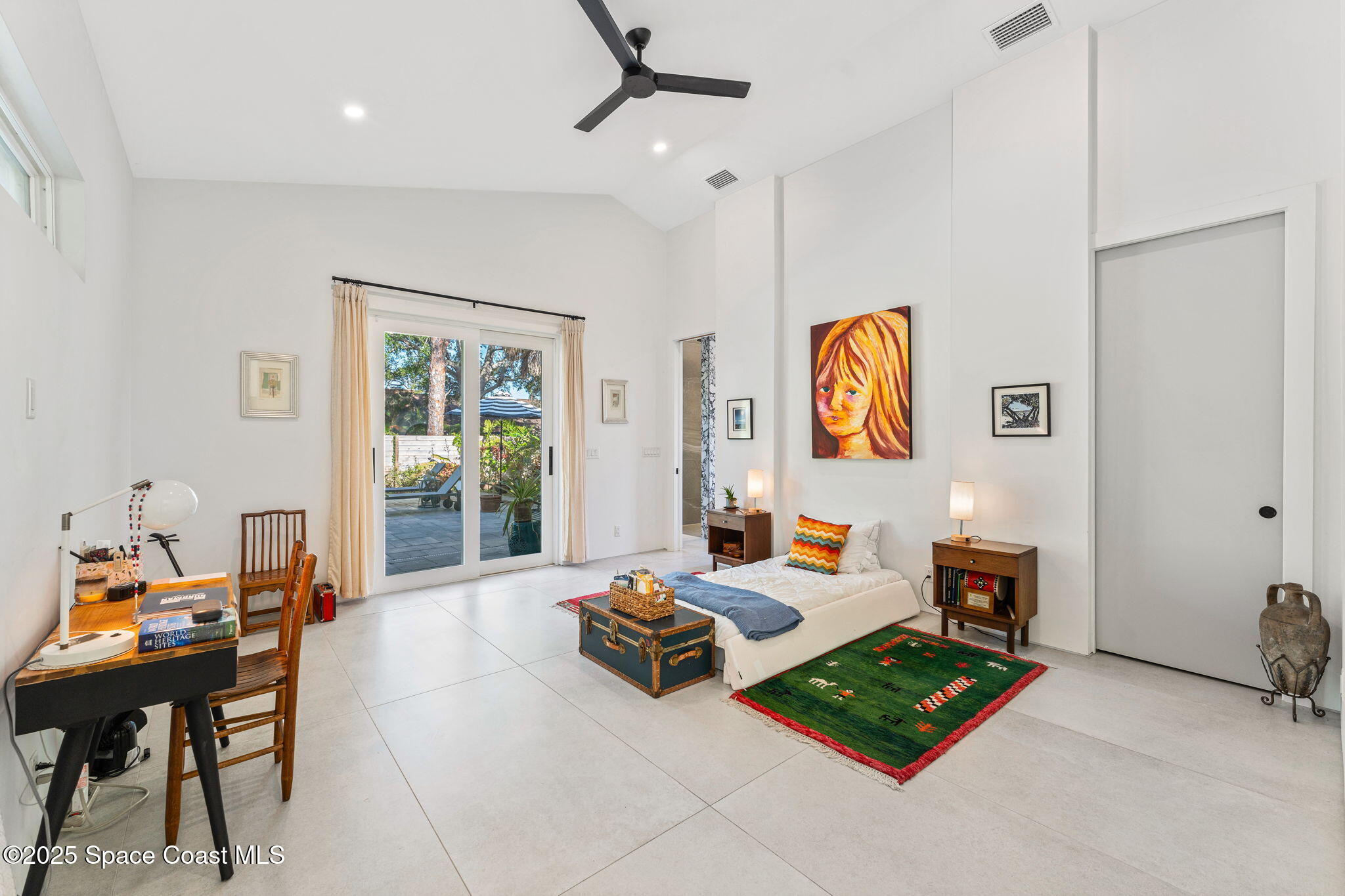 2619 Forest Drive Melbourne, FL 32901 - Photo 18 of 44 a living room with furniture and a window