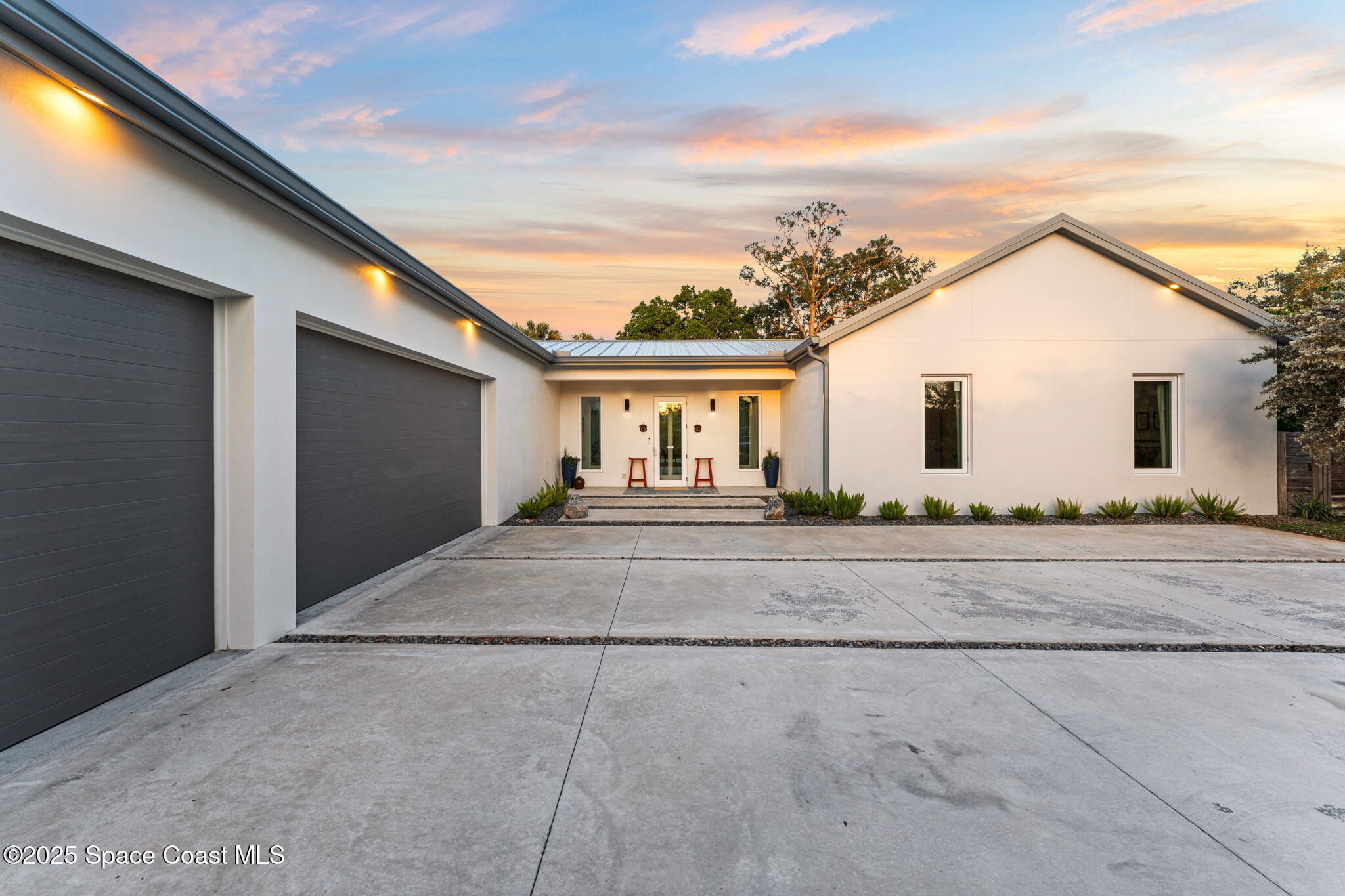 2619 Forest Drive Melbourne, FL 32901 - Photo 2 of 44 a view of house and outdoor space