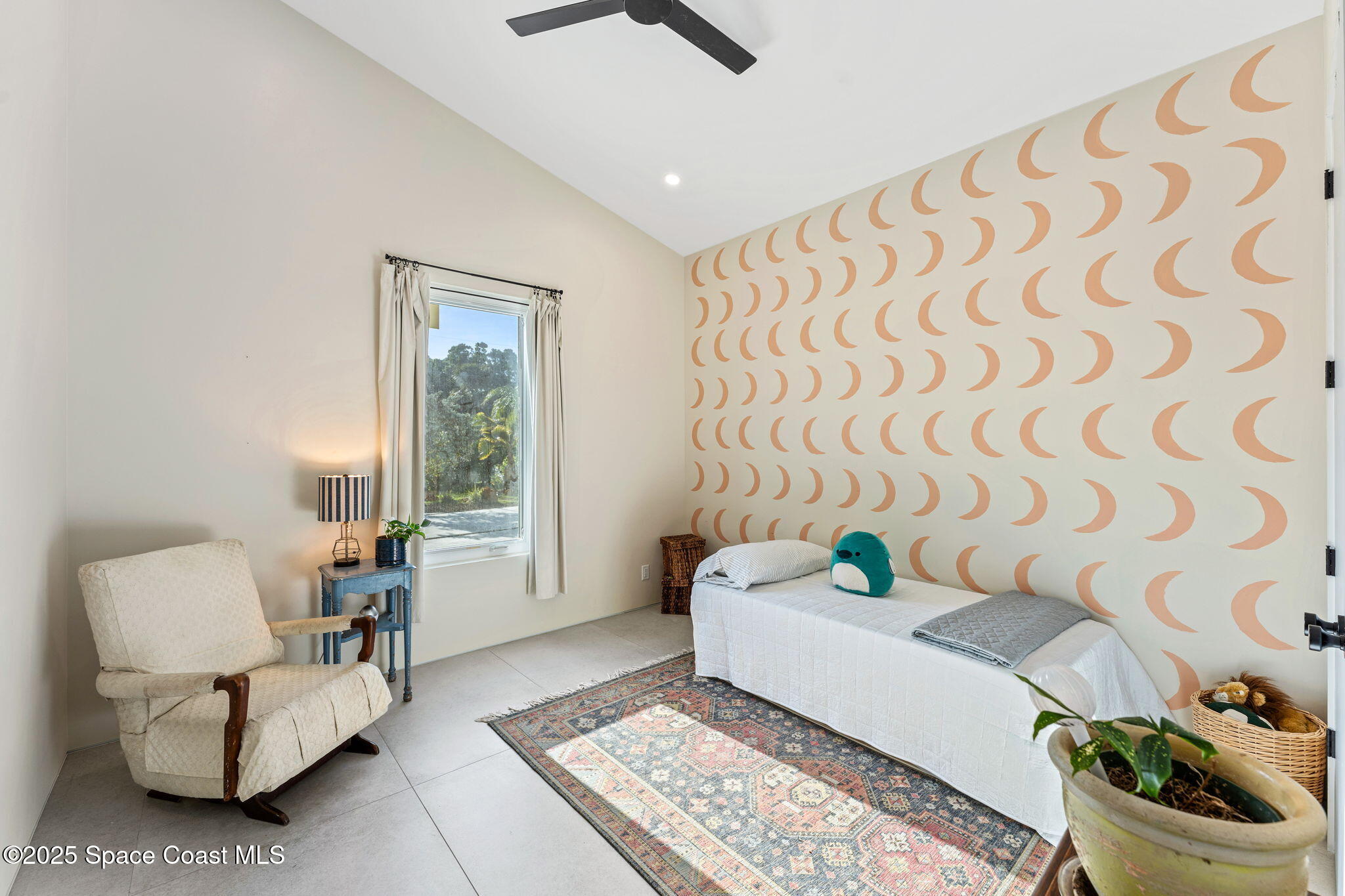 2619 Forest Drive Melbourne, FL 32901 - Photo 23 of 44 a living room with furniture and a window