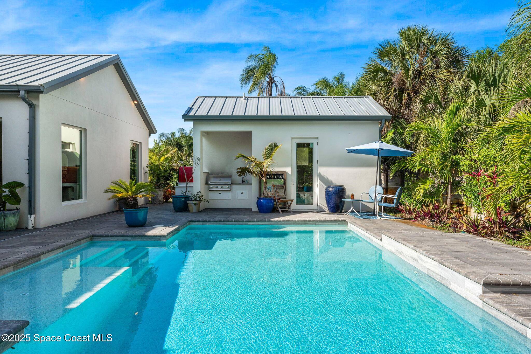 2619 Forest Drive Melbourne, FL 32901 - Photo 32 of 44 a view of a house with garden