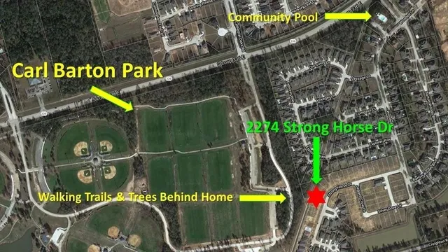 a front view of a house with garage