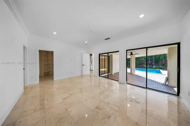 a spacious bathroom with a bathtub sink and mirror