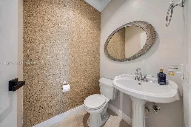 a view of an empty room with windows