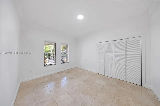 a bathroom with a toilet and a bathtub