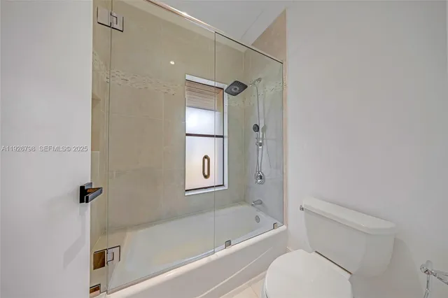 a view of a hallway with stairs