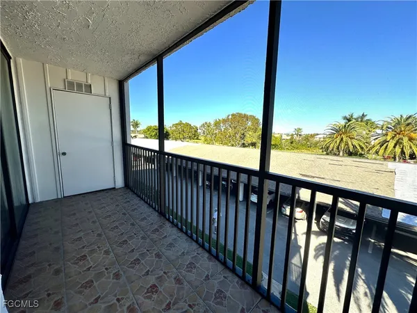 a view of a street view from a balcony