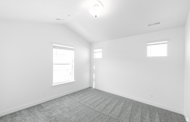 4655 South 720 West, Unit I304 Mapleton, UT 84664 - Photo 6 of 16 Carpeted empty room with lofted ceiling and baseboards