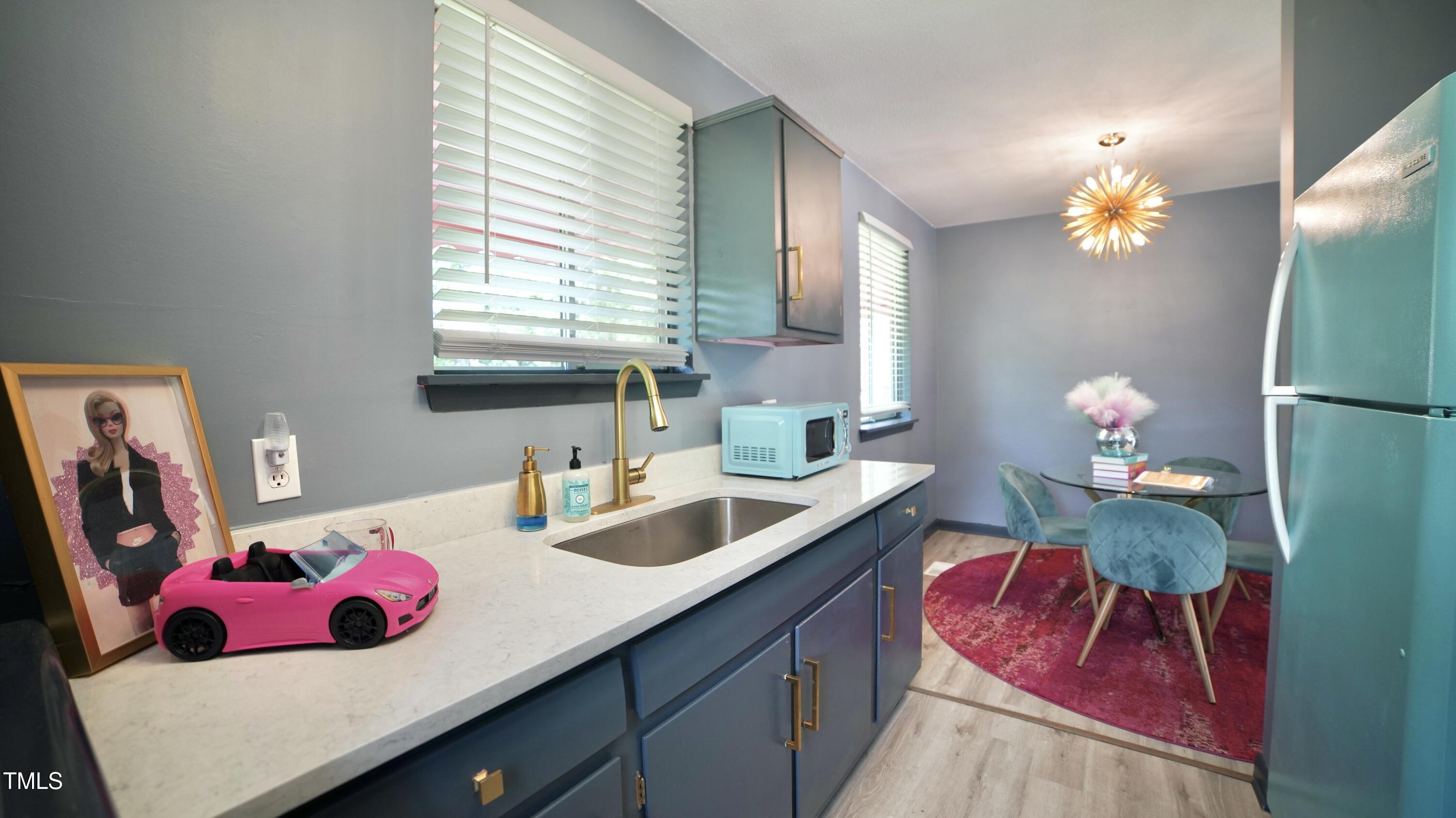 2006 Waters Drive Raleigh, NC 27610 - Photo 10 of 16 a bathroom with a sink mirror and window