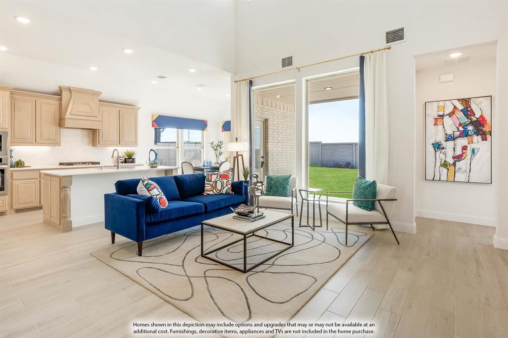2014 Dundalk Lane Forney, TX 75126 - Photo 6 of 38 a living room with furniture and a large window