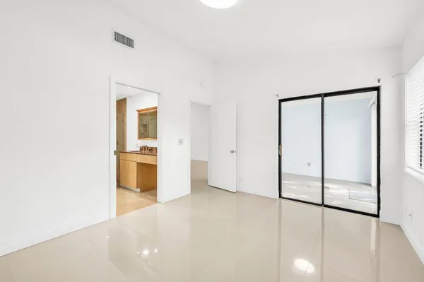 $389,900 | 65 Centennial Court, Deerfield Beach, FL 33442