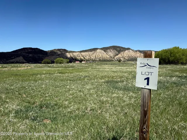 a view of a houses with a yard