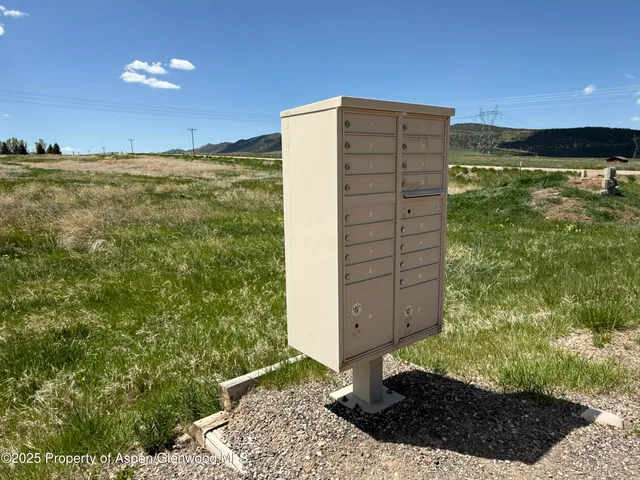 a view of a back yard from a fountain