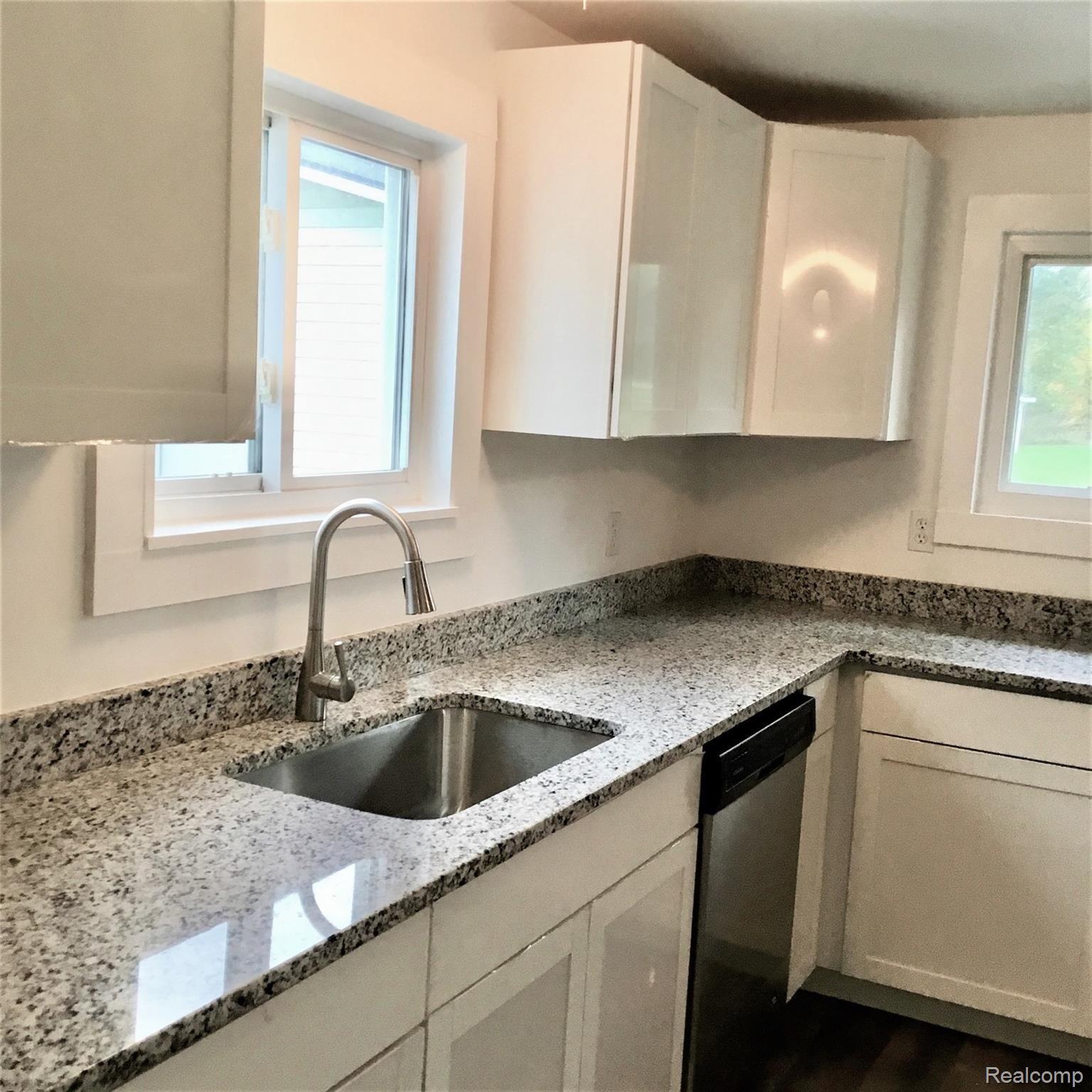 2920 East Dryden Road Metamora, MI 48455 - Photo 17 of 34 Granite counters, new cabinets and dishwasher