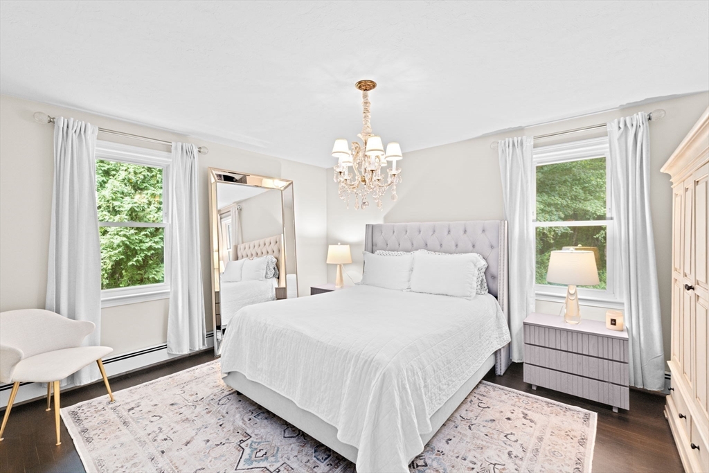 40 Brewster Road Cohasset, MA 02025 - Photo 19 of 42 a bedroom with a bed and a window