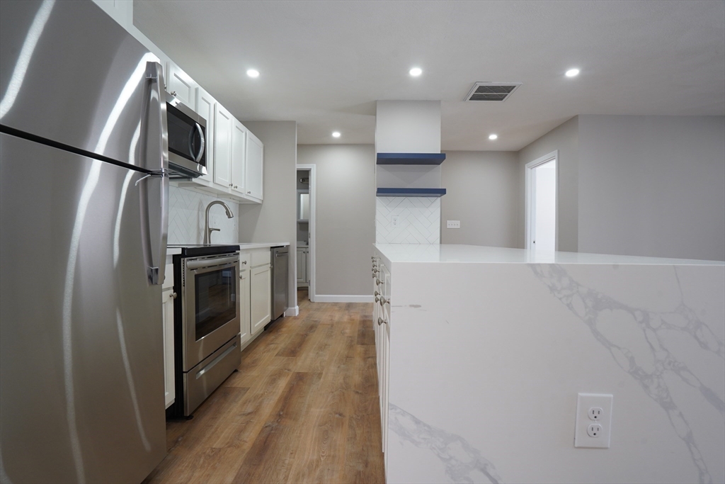 404 Langley Road, Unit 301 Newton, MA 02459 - Photo 2 of 25 Gallery Image 2