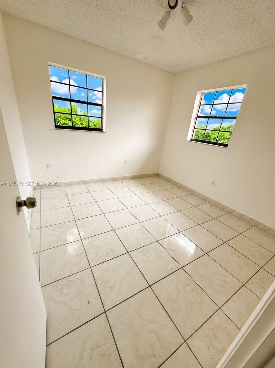 2582 West 56th Street, Unit 201 Hialeah, FL 33016 - Photo 8 of 20 a view of a room with window