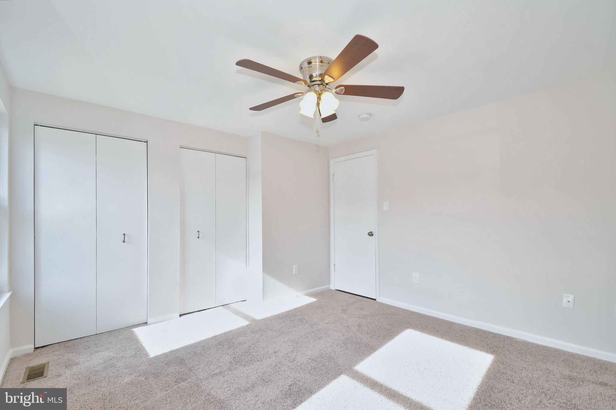 28 Pine Chip Court Baltimore, MD 21236 - Photo 28 of 32 a view of a hallway with a ceiling fan