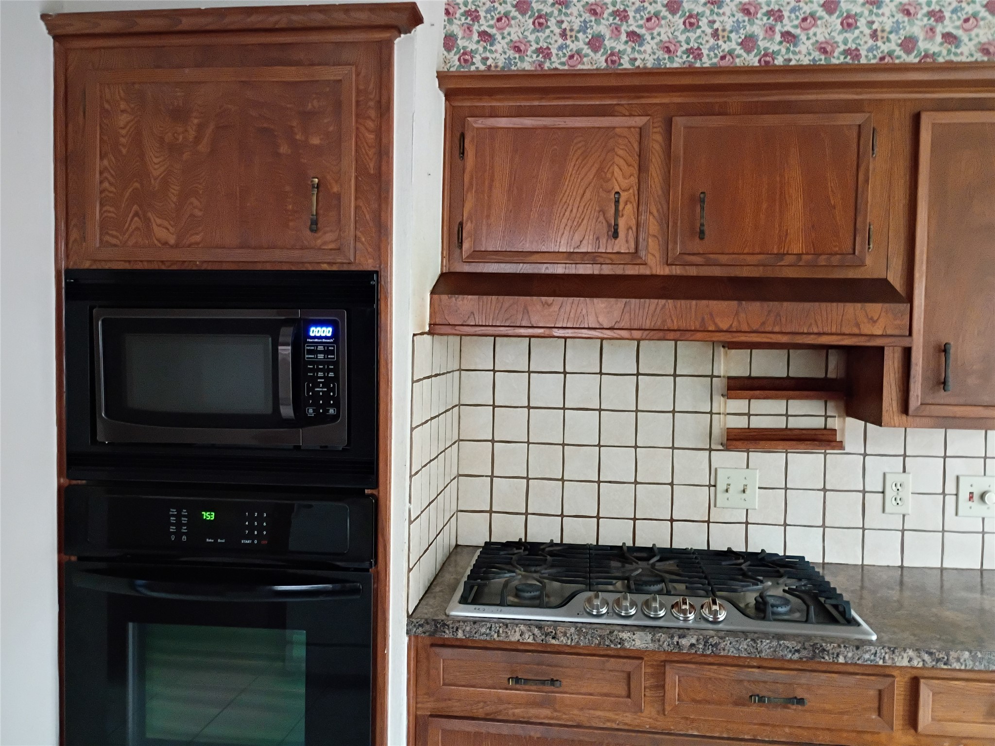 2847 Field Line Drive Sugar Land, TX 77479 - Photo 9 of 13 a kitchen with a stove and cabinets