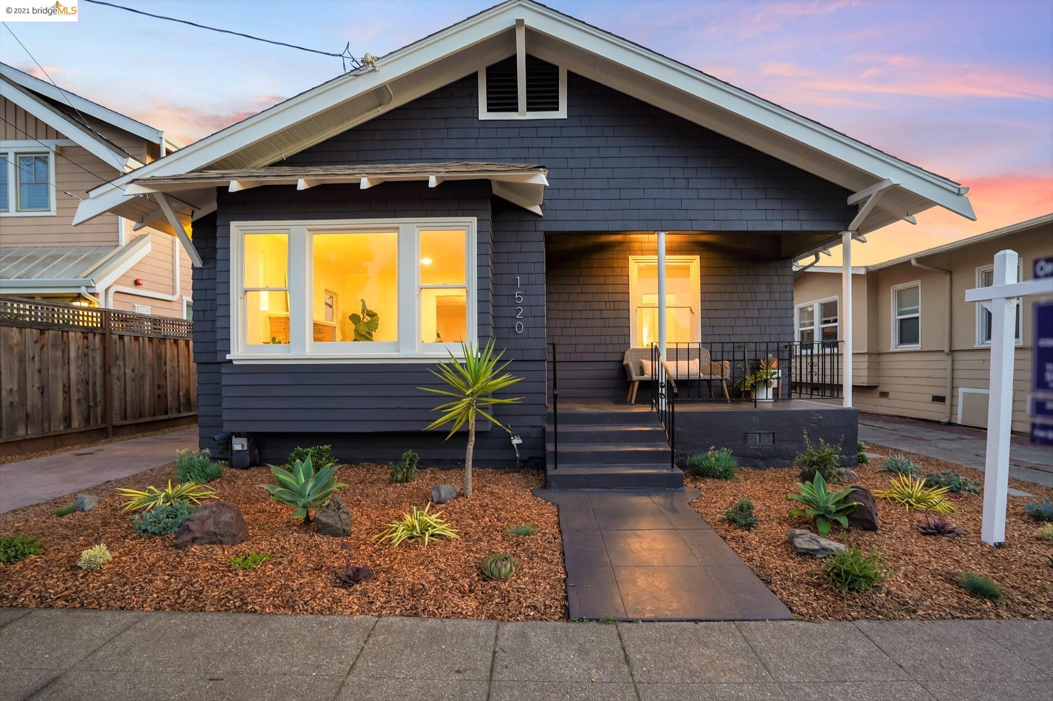 1520 Stuart Street Berkeley, CA 94703 - Photo 1 of 1 a front view of a house with garden