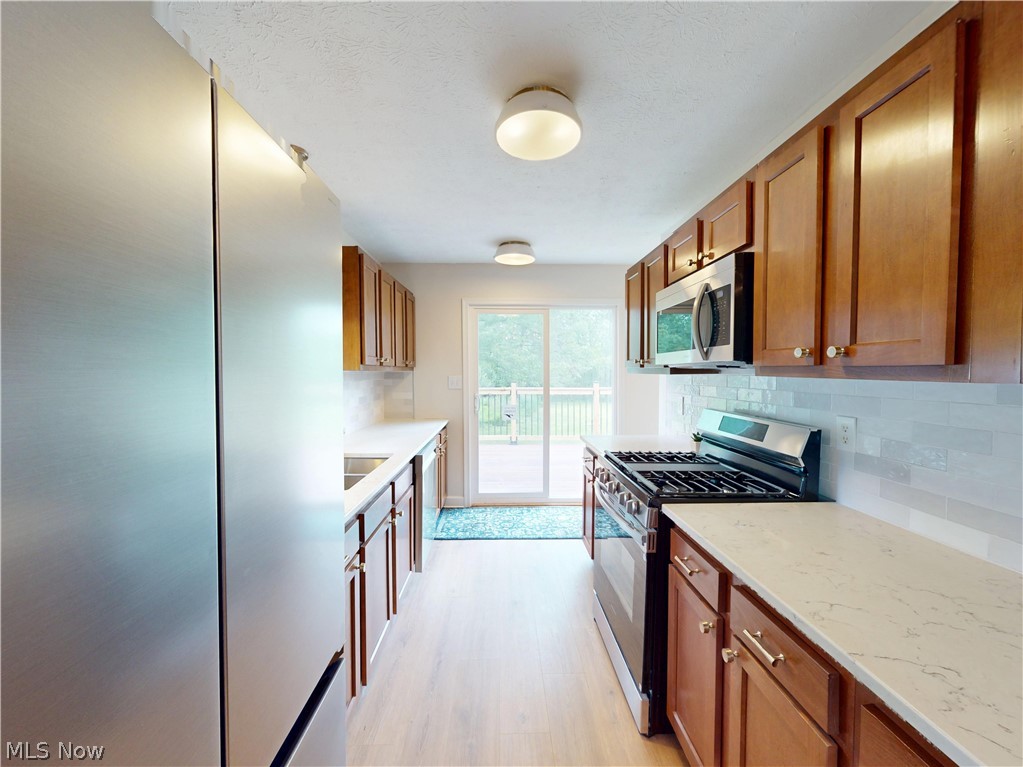 3264 Grenfall Road Norton, OH 44203 - Photo 6 of 45 Beautifully renovated kitchen with stainless appliances