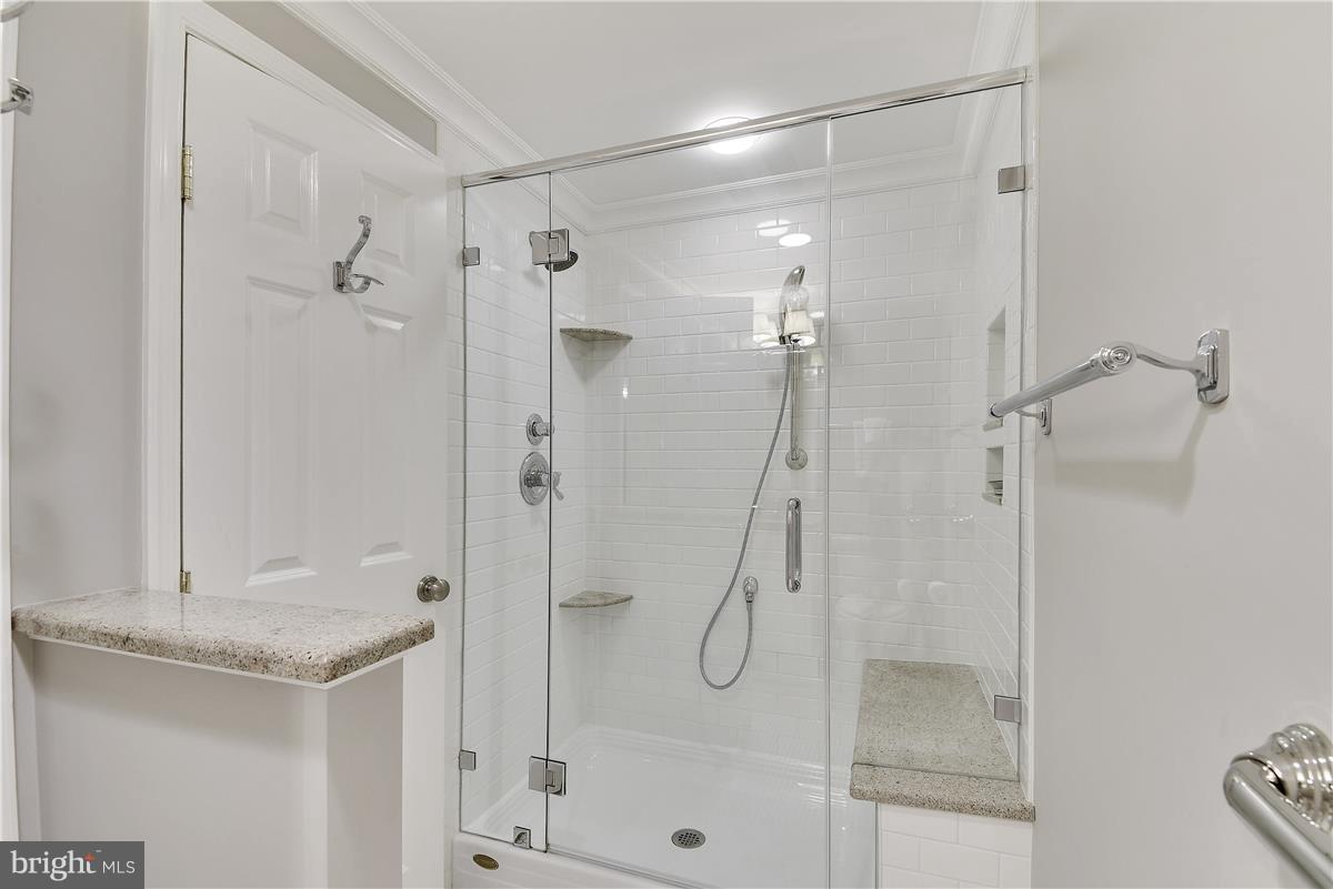 5 Cold Spring Court Potomac, MD 20854 - Photo 11 of 30 a bathroom with a shower and a sink