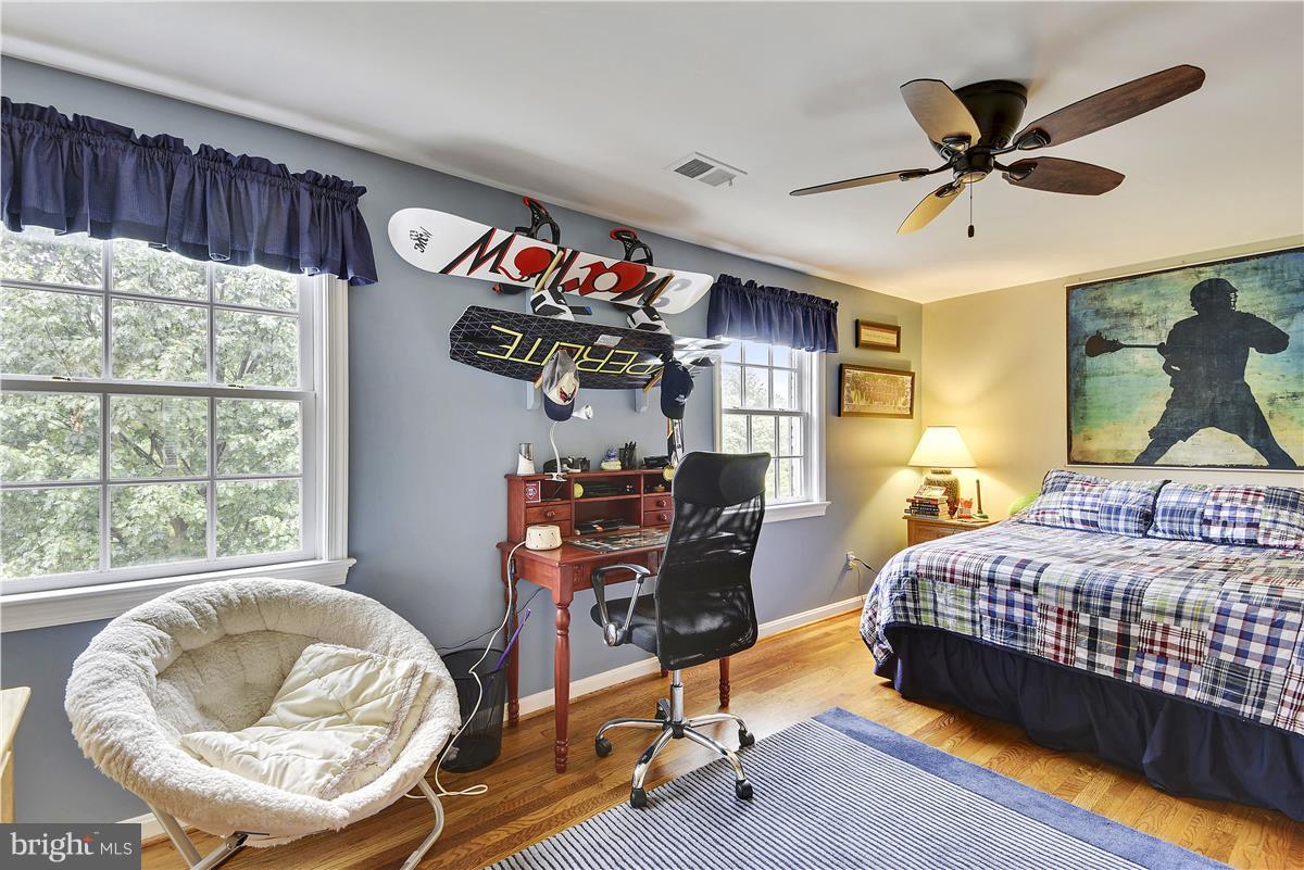5 Cold Spring Court Potomac, MD 20854 - Photo 15 of 30 a bedroom with bed and a window