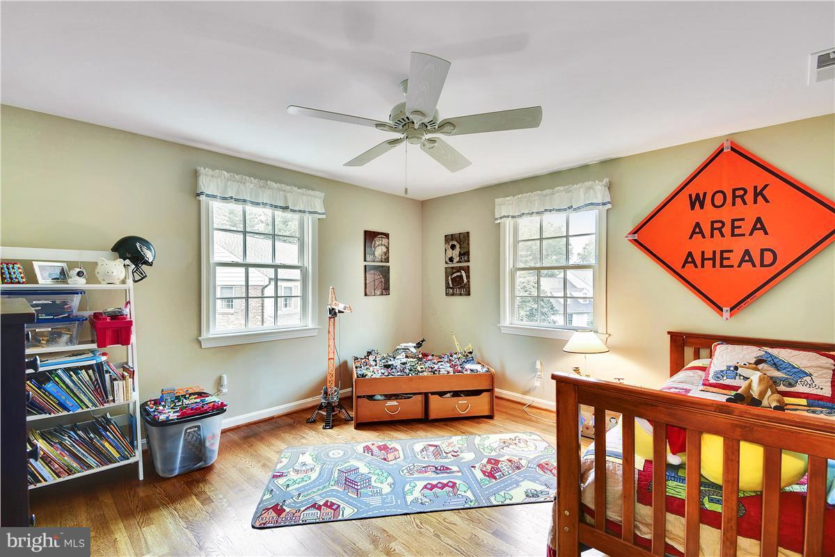 5 Cold Spring Court Potomac, MD 20854 - Photo 16 of 30 a bedroom with furniture and a window