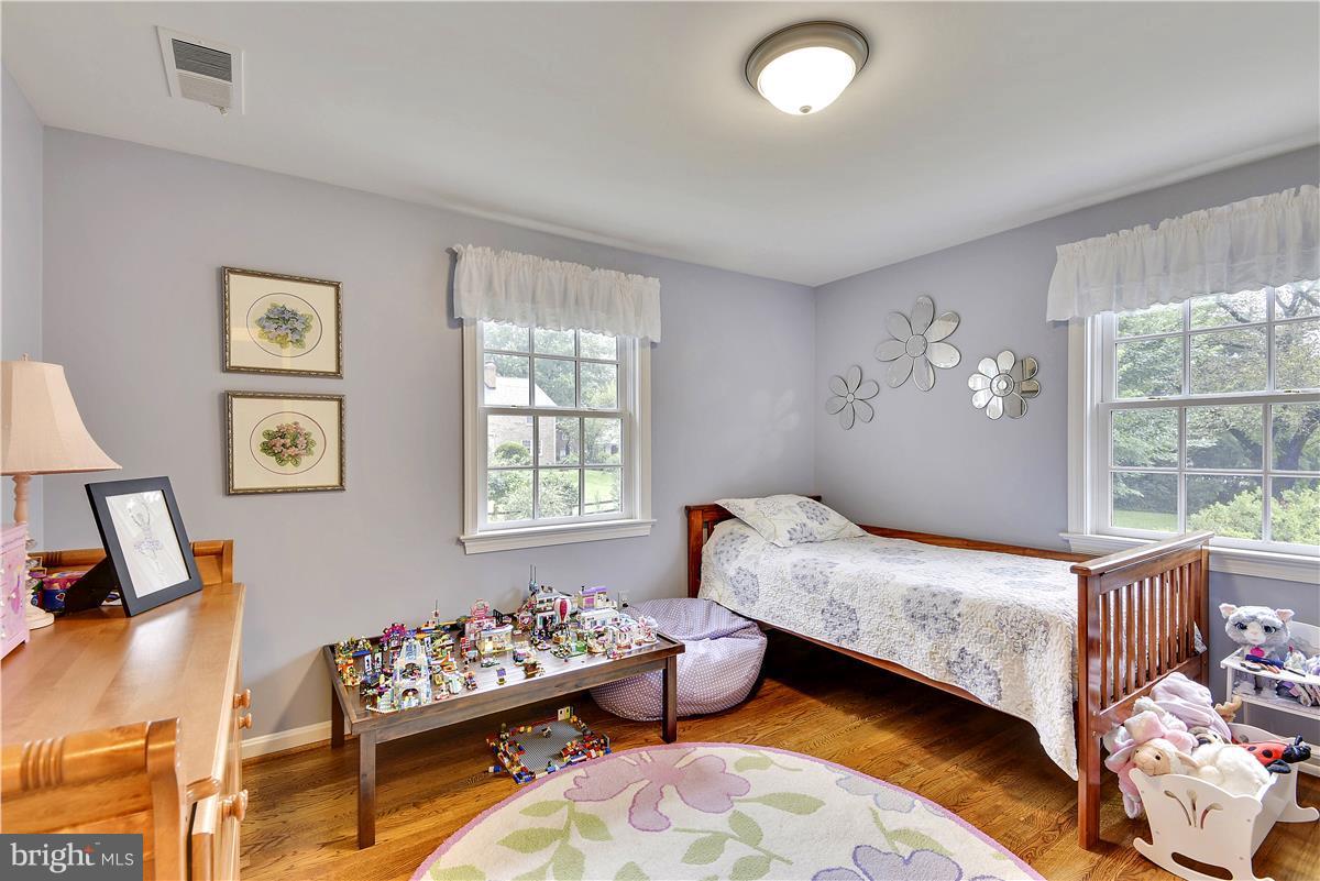 5 Cold Spring Court Potomac, MD 20854 - Photo 17 of 30 a bedroom with bed and a window