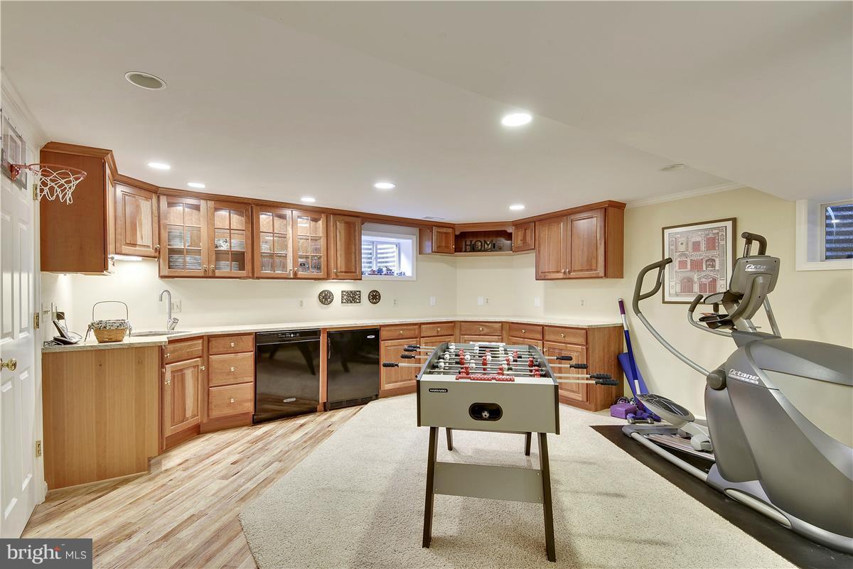 5 Cold Spring Court Potomac, MD 20854 - Photo 20 of 30 a large kitchen with stainless steel appliances granite countertop a stove and a sink