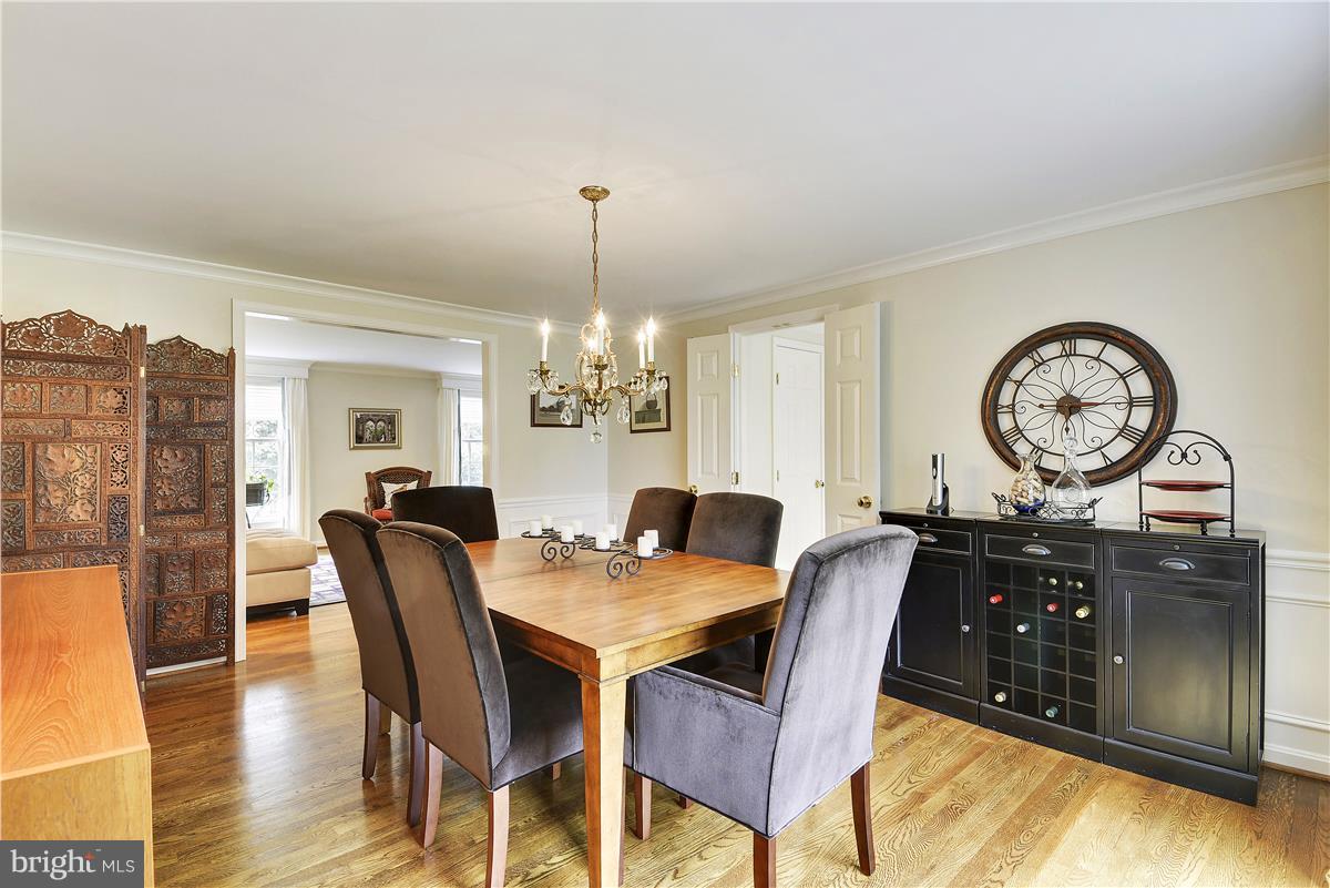 5 Cold Spring Court Potomac, MD 20854 - Photo 4 of 30 a view of a dining room with furniture window and wooden floor