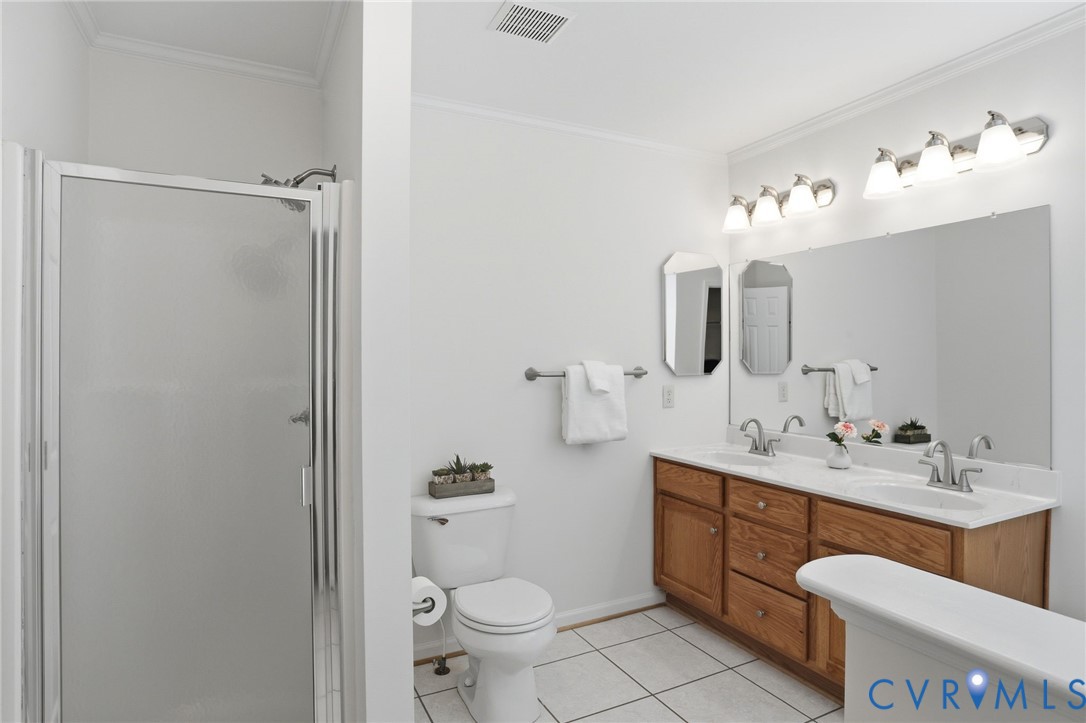 6714 Belmont Road Chesterfield, VA 23832 - Photo 25 of 52 Primary bathroom on first floor with fresh paint,