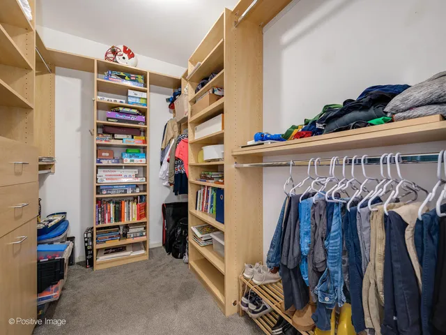 a bedroom with furniture and a couch