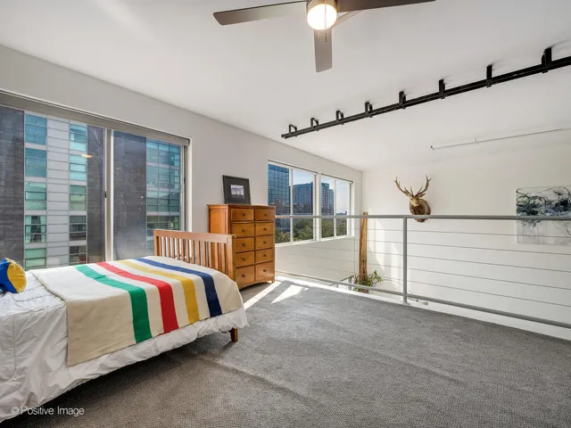 a view of roof deck with patio