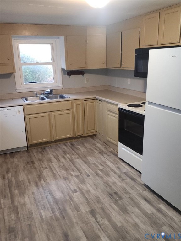 480 Level Green Road Lancaster, VA 22503 - Photo 3 of 9 Kitchen with white appliances, light countertops,