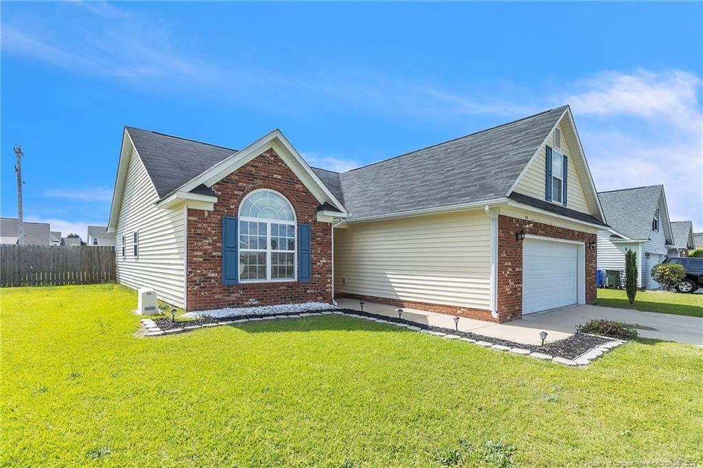 1948 Yellowbrick Road Fayetteville, NC 28314 - Photo 22 of 22 a front view of a house with a yard