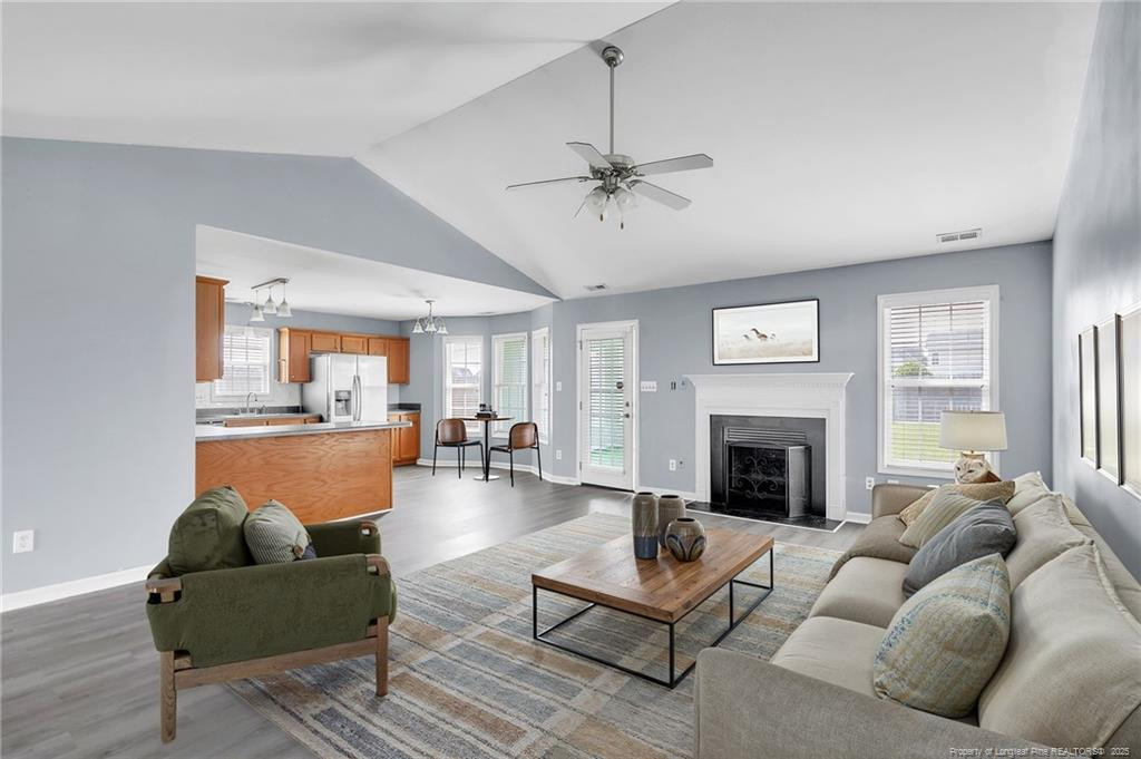1948 Yellowbrick Road Fayetteville, NC 28314 - Photo 3 of 22 a living room with furniture or fireplace and a table
