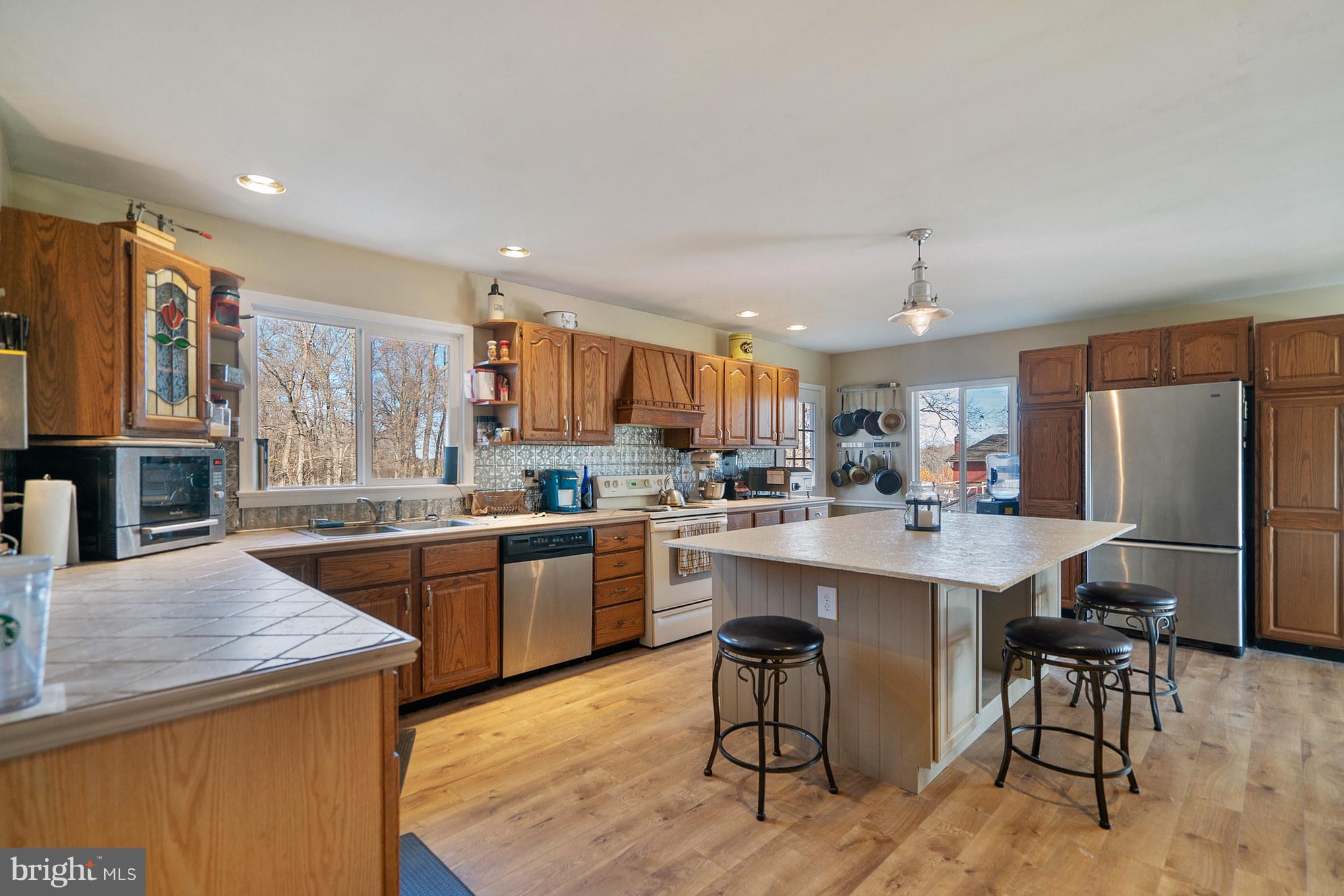 10600 Alum Springs Road Culpeper, VA 22701 - Photo 3 of 30 Large kitchen with SS appliances