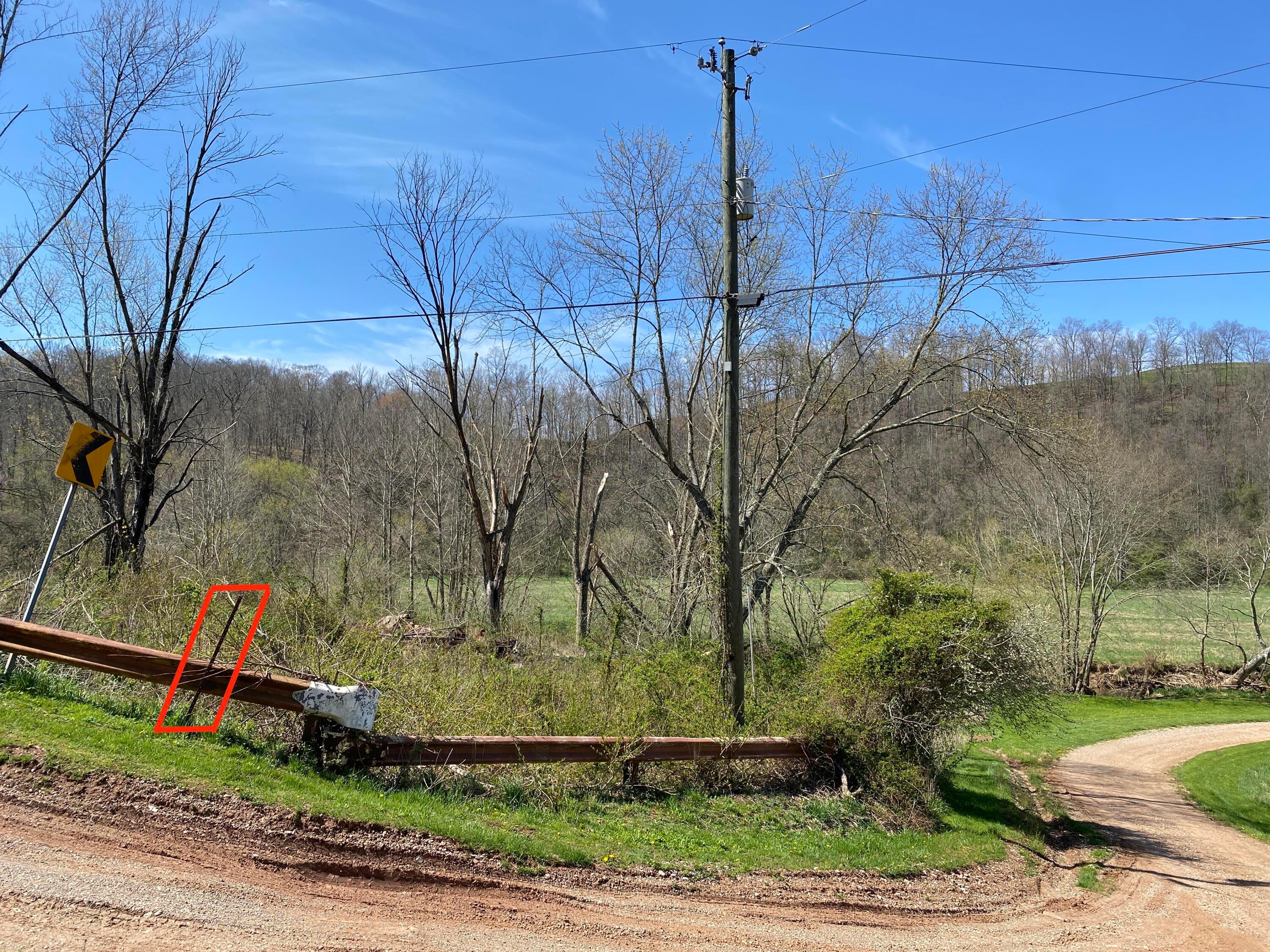 0 West Side Tr Reedsville, OH 45772 - Photo 6 of 19 Corner of property, property stake marked in red.