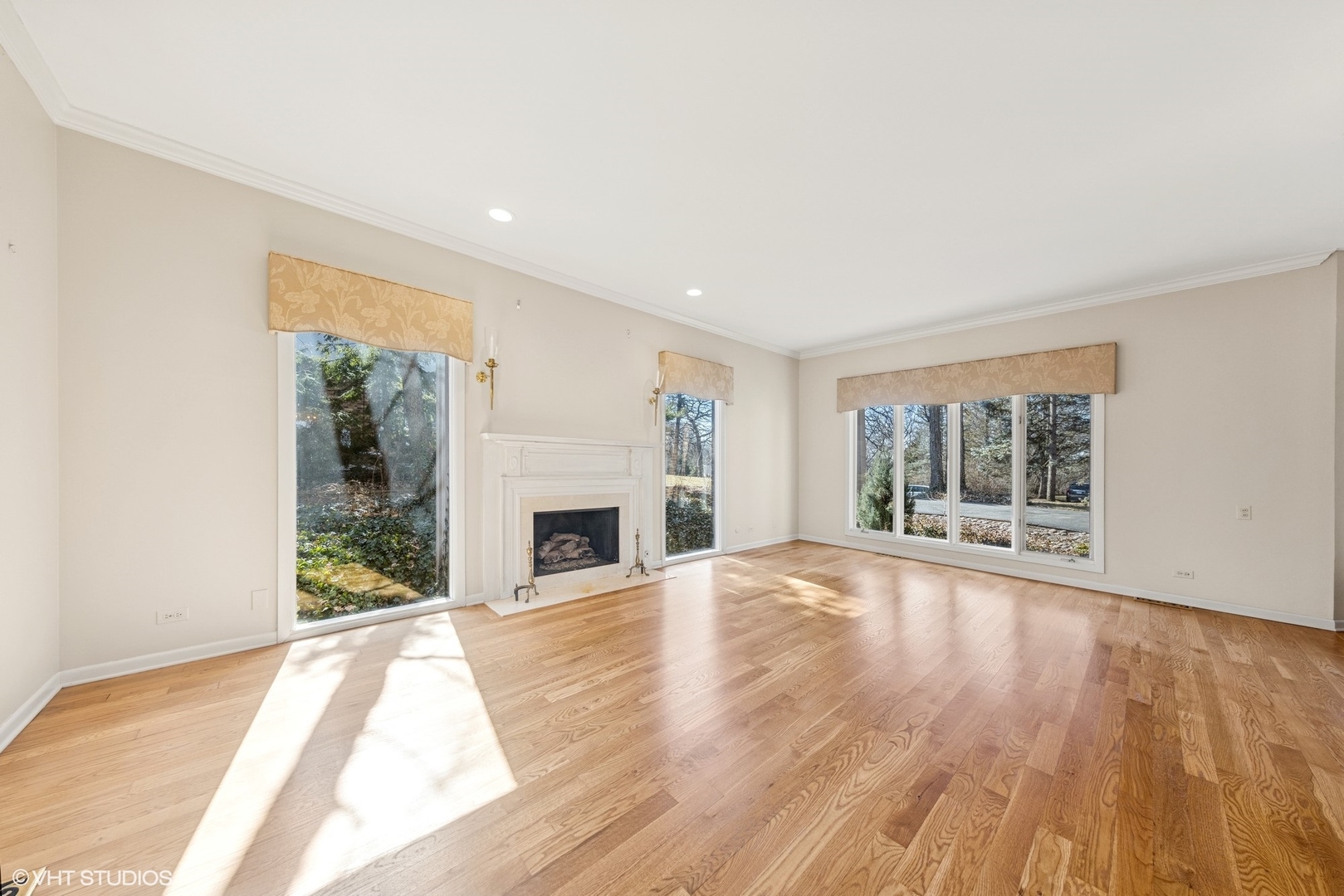6418 Apache Drive Indian Head Park, IL 60525 - Photo 3 of 35 a view of an empty room with wooden floor and a window