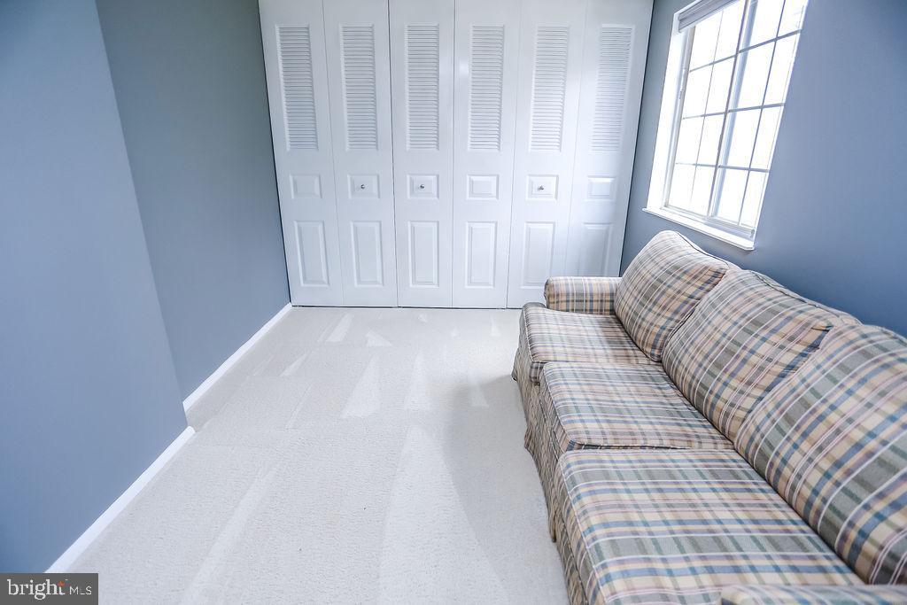 1646 Harvest Green Court Reston, VA 20194 - Photo 19 of 37 Upstairs bedroom. That's a big sofa!
